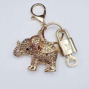 Authentic Louis Vuitton Lock & Key with Unbranded Elephant Charm, Keychain